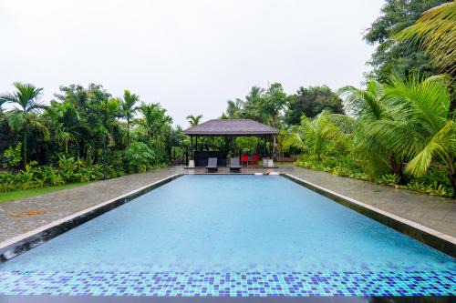 Karjat Villa | ELIVAAS Signature AARAA VILAS 4-BHK Luxury Pool Villa with Home Theatre, Sports Court & Panoramic Hill Views