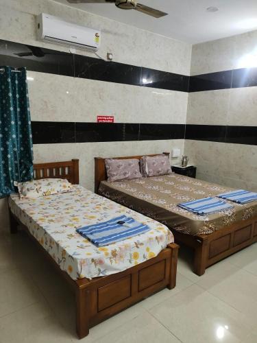 Courtallam Hotel | HAnsHari Homestay