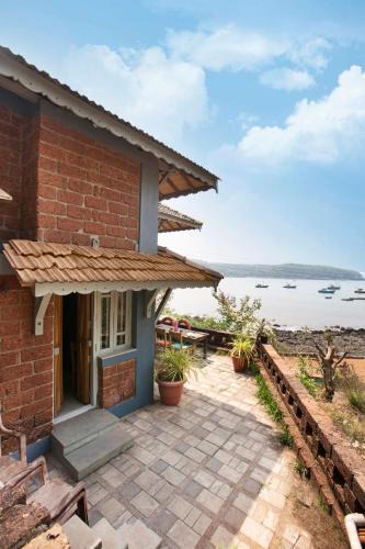 Guhagar Villa | SaffronStays Crescent Bay, Palshet