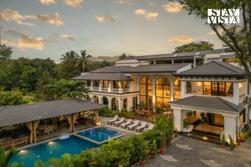 Vagator Villa | StayVista at Casa Dos Reis with Lawn & Pool