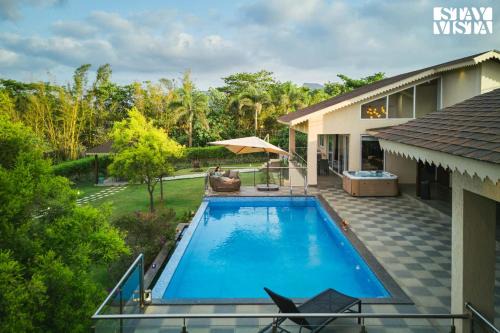 Lonavala Villa | StayVista's The Tavern At Canary Farms - Mountain-View Luxury Mansion with Infinity Pool & Games Zone