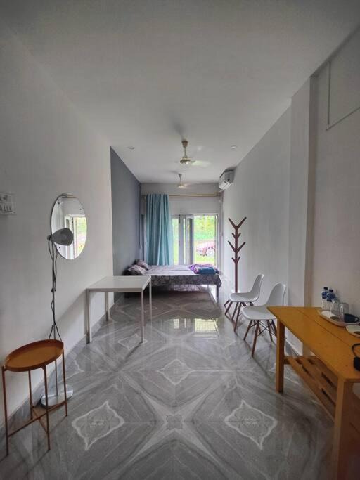 Jorhat Apartment | White Minimalist Room