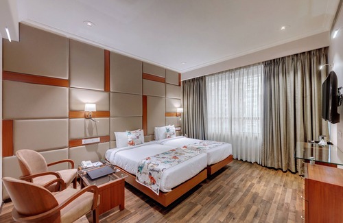 Girgaon Hotel | Adiva Residency Beacon, Grant Road, Mumbai