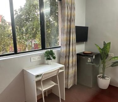 Koregaon Park Apartment | Flow: Private Studio in Koregaon Park. WiFi AC SmartTv