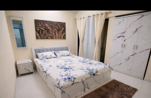 Thane West Apartment | Bright balcony 2-bedroom apartment with AC in vibrant Thane/Mulund