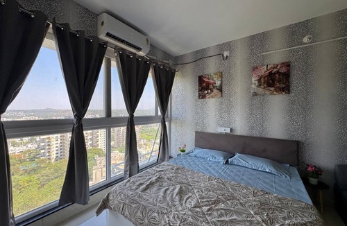 Pashan Apartment | Cozy 1-bedroom studio in lovely Pune with AC and fitness room
