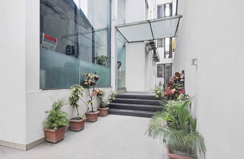 Mysore House | DeluxeTownhouse Oak City Center Mysore Palace