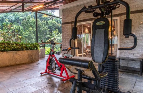 Kunchithanny Villa | ELIVAAS Signature Kayyath Valley 4-BHK Villa With Scenic Mountain View , Private Outdoor Pool, Gym And In-House Tea Garden