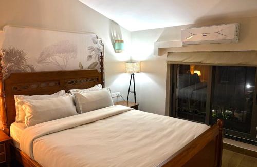 Sainagar Apartment | Exclusive Family 2BHK Duplex with Pool & Balcony near Beach