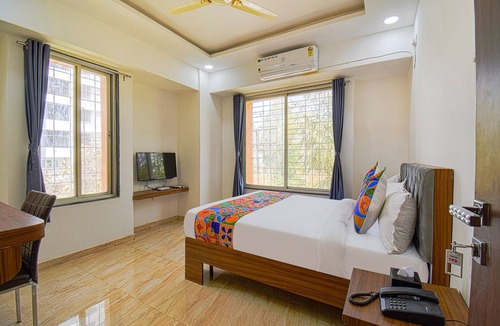 Mundhwa Hotel | FabHotel Red Velvet & Suites