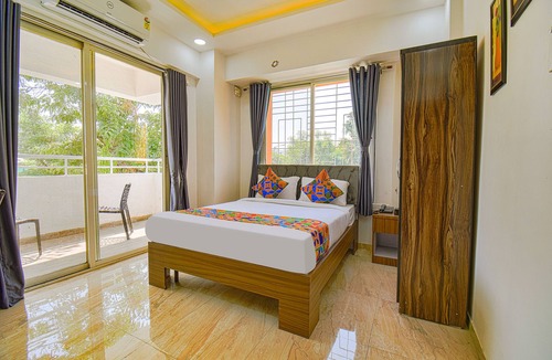 Mundhwa Hotel | FabHotel Red Velvet & Suites