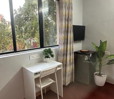 Koregaon Park Apartment | Flow: Private Studio in Koregaon Park. WiFi AC SmartTv