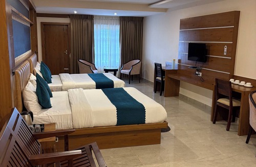 Pudumund Hotel | Grandis inn by avkanz luxury suite rooms in the hill top of ooty