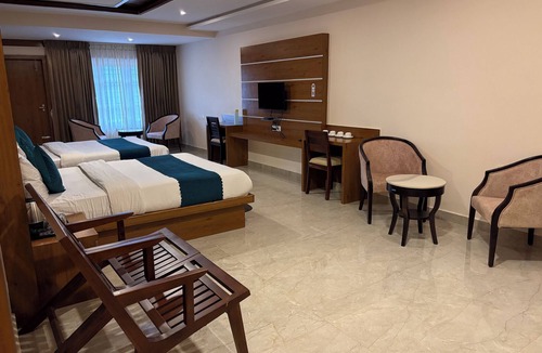 Pudumund Hotel | Grandis inn by avkanz luxury suite rooms in the hill top of ooty