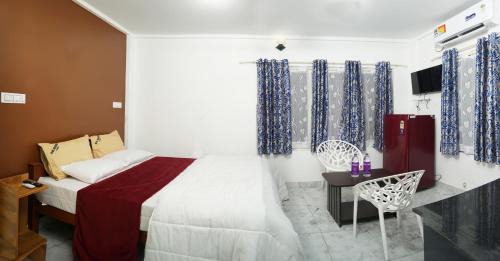 Kaloor Hotel | M M Residency