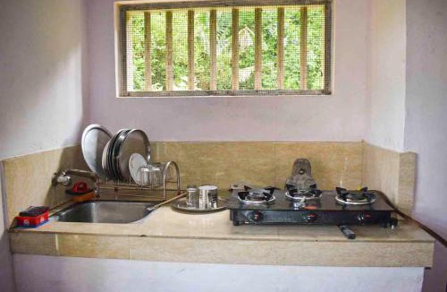 Perumbaikad House | Meenachil Cliff