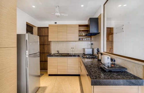 Kurla Apartment | OV Premium Apartments near BKC by Square One Stays