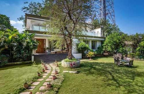 Alibaug Villa | SaffronStays 7 Seas - 7BR pool villa with gazebo, bar & lawn, perfect for celebrations near Mandwa Jetty