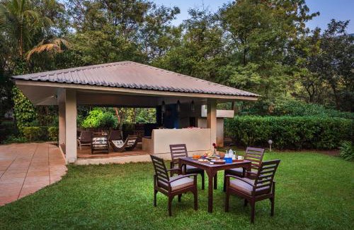 Alibaug Villa | SaffronStays Laguna - 4BR vintage-chic villa with unique pool, gazebo & terrace sit-outs near Mandwa Jetty, Alibaug