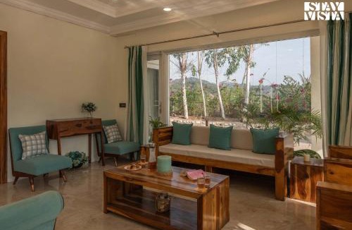 Kishangarh Villa | StayVista at Golden Lark with Wi-Fi, Pool & Lawn