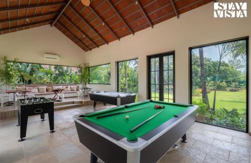 Pali Villa | StayVista at Stories by the River with Pool & Bar