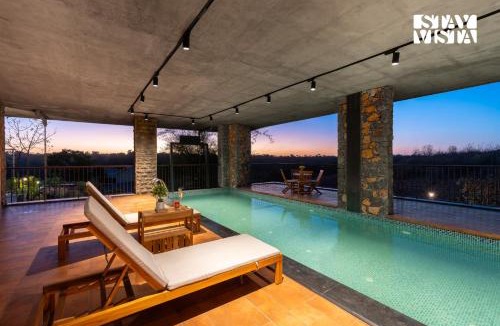 Nashik Villa | StayVista at The Earth Stone with Infinity Pool, Lawn