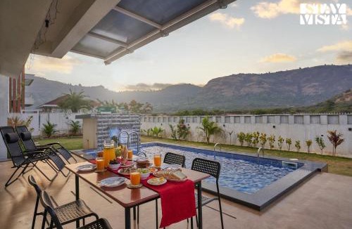 Lonavala Villa | StayVista's Kaarma Villa - Valley-View Villa with Outdoor Pool, Lawn featuring a Gazebo & Machan