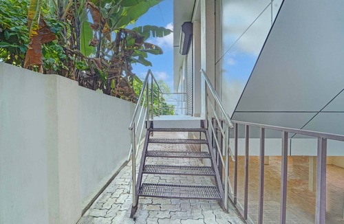 Kochi House | Super Hotel O Ambalamedu