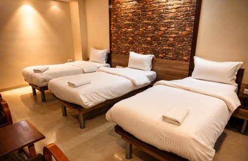 GIDC Hotel | The Palm Regency Beacon Vapi