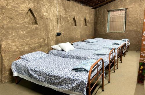 Nashik House | The Peepal mud homes farm stay