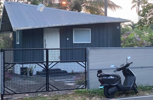North Paravur House | This tiny home offers the perfect blend of modern comfort and seaside charm.