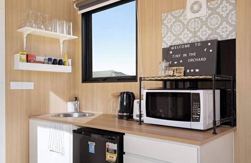 Mitchell Park House | Tiny in the Orchard by Tiny Away