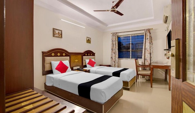 Capital O Elegant Amethyst Business Hotel Near Ragigudda Sri Prasanna Anjaneyaswamy Temple in Bangalore