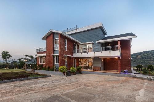 ELIVAAS Nimishka 5 BHK Villa with Pvt Pool, Garden & Scenic Views