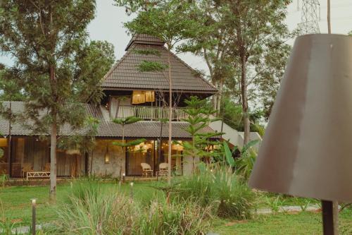 ELIVAAS privé Ananta Bliss Talam Pet-friendly Retreat On 1-Acre of Land With 2-BHK Villa & a Tent, Shared Pool, Gazebo, Garden & a Firepit