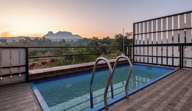 ELIVAAS White House 4BHK Villa With Pool