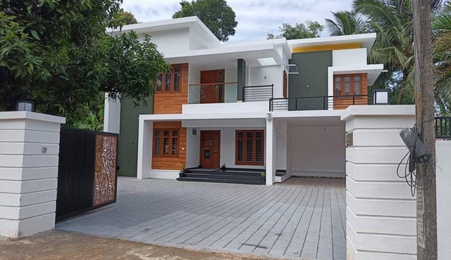 Ethereal Retreat 4-bedroom villa in delightful Chengannur with WiFi, AC