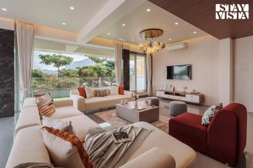 StayVista at Majestic Whispers with Rooftop Pool