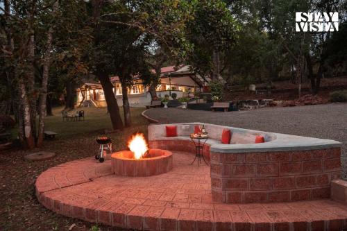 StayVista at The Floramer with Bonfire, Lawn