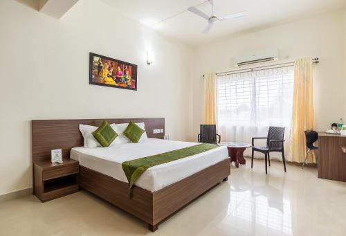 Treebo Pappilon Palace - PVS Circle in Mangalore