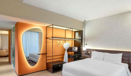 Premier Suite with Complimentary IMFL from 6:00 pm to 8 pm at Barcode and Two Way Airport Transfer