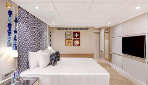 Deluxe King Room with Balcony - Beer Bucket 4 on arrival, INR 1000 SPA Credit, 15% Discount on Food & Beverages