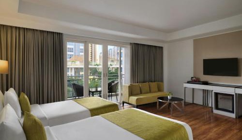 Winter Green Twin Room with Balcony and City View