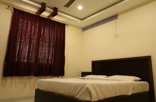 Theni Hotel | ES Residency
