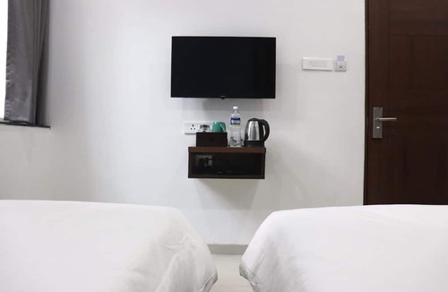 Erandwane Hotel | Sharman Suites