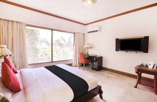 Aarey Colony Hotel | Capital O 44162 Royal Palms Hotel - Rose Collection