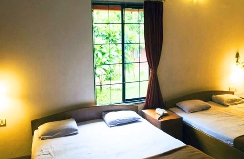 Vasind Resort | Shrusti Farms Resort