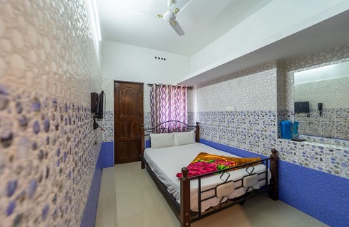 Valparai Hotel | Sri Nandha Luxury Comforts