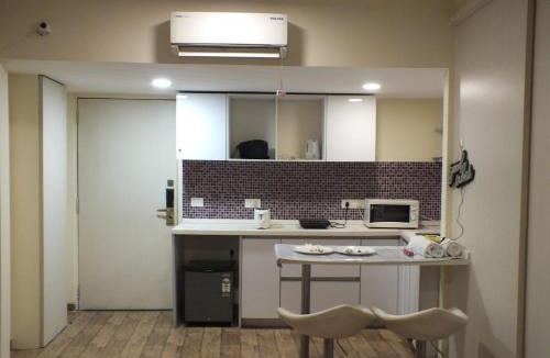 Surat Apartment | Rajhans belliza manage by Dhivine Inn