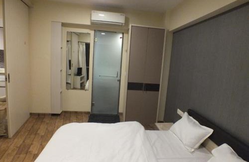 Surat Apartment | Rajhans belliza manage by Dhivine Inn